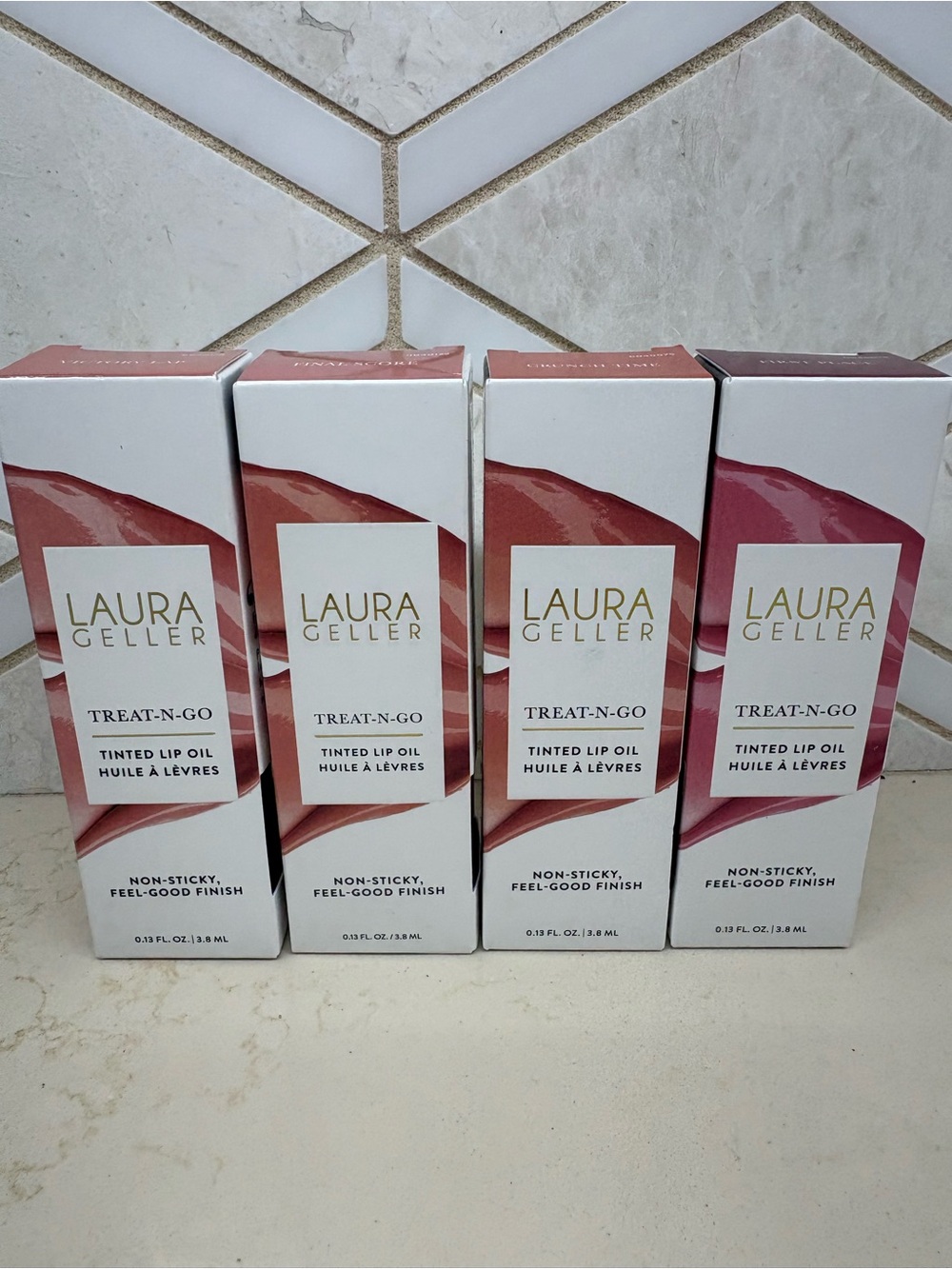 Laura Geller TREAT-N-GO Tinted Lip Oil 4 pcs